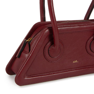 BOLSA SPAGHETTI COURO ADÔ COR FRAMBOESA